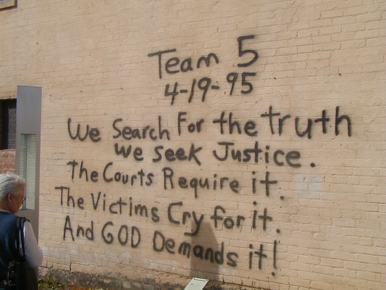 "We search for the truth we seek justice. The courts Require it. The victims cry for it. And God demands it." Spray painted on a wall